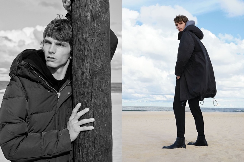 Hitting the beach, Erik Van Gils wears a down-filled jacket, waterproof down-filled coat, organic cotton hoodie, and merino wool jersey trousers from Reserved's Premium Sustainable collection.