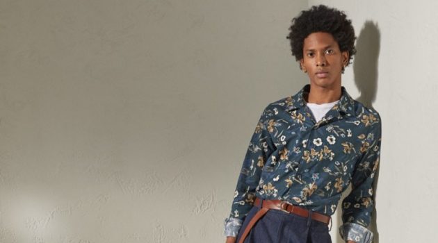 Todd Snyder Eases Into New Year with Resort Style Channeling a resort cool, Rafael Mieses rocks a Todd Snyder Italian floral camp collar long-sleeve shirt in navy with Japanese denim pleated pants in indigo.