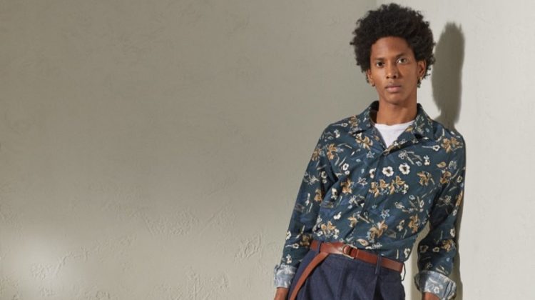 Channeling a resort cool, Rafael Mieses rocks a Todd Snyder Italian floral camp collar long-sleeve shirt in navy with Japanese denim pleated pants in indigo.