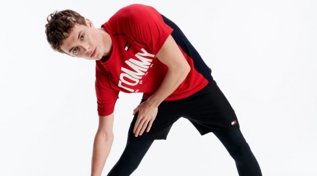 Tommy Sport Heads Into the New Year with Fresh Styles Stretching, João Knorr wears activewear from Tommy Sport.