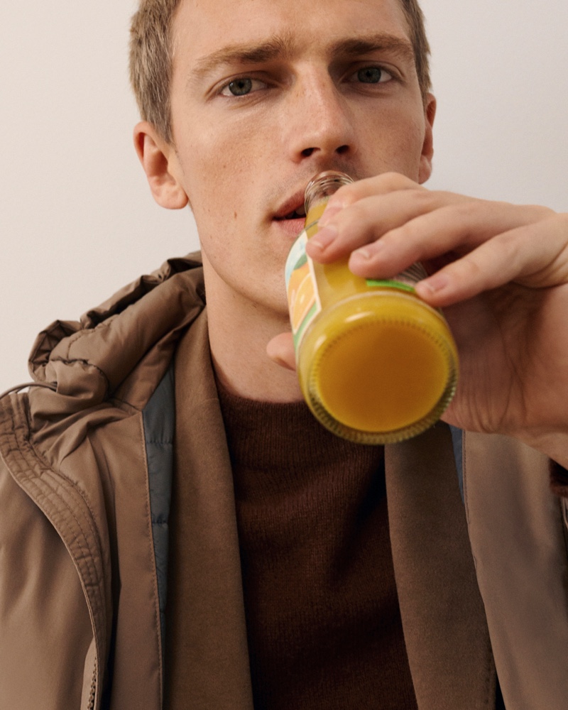 Drinking orange juice, Victor Nylander begins a stylish day with Massimo Dutti.