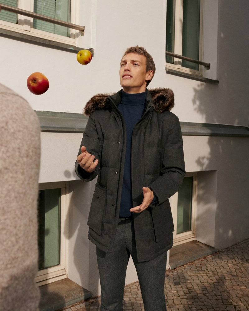 Victor Nylander sports a charcoal-colored winter look from Massimo Dutti.