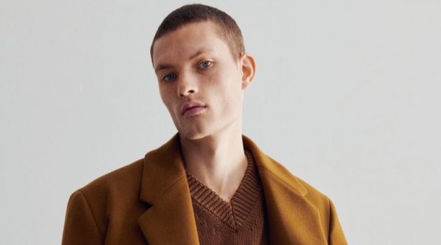 William Dons Outerwear + More for Zara William Los dons a relaxed fit double-breasted coat with a v-neck sweater and jeans from Zara.