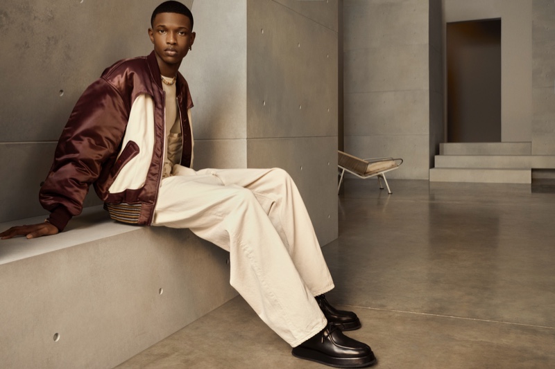 Sporting a bomber and relaxed-cut pants, Malik Anderson stars in AMBUSH's spring-summer 2021 men's campaign. » Ethan James Green Photographs Malik for AMBUSH Spring Campaign Sporting a bomber and relaxed-cut pants, Malik Anderson stars in AMBUSH's spring-summer 2021 men's campaign.