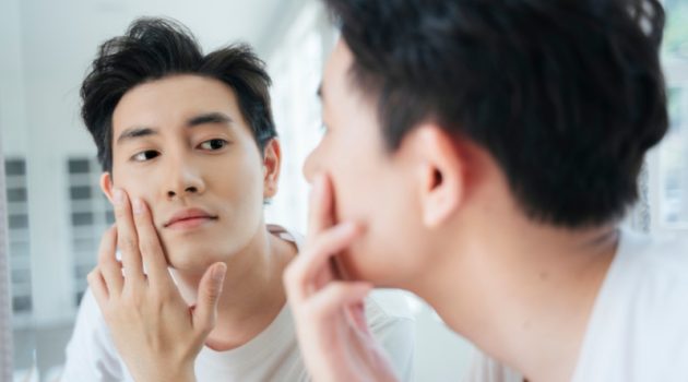 5 Beauty Products That Also Offer Pain Relief Help Asian Man Mirror Grooming