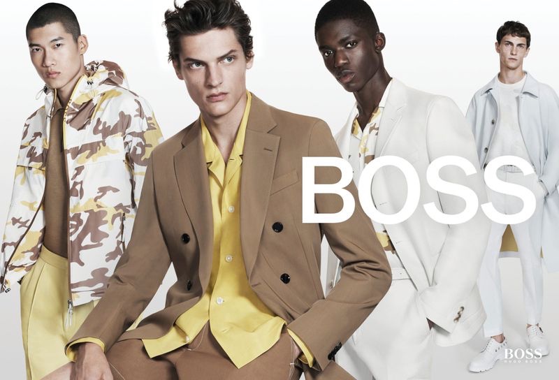 Models Yun Hoseok, Valentin Caron, Jeremiah Berko-Fourdjour, and Luc Defont-Saviard don yellow and neutral-toned looks for BOSS's spring-summer 2021 men's campaign.