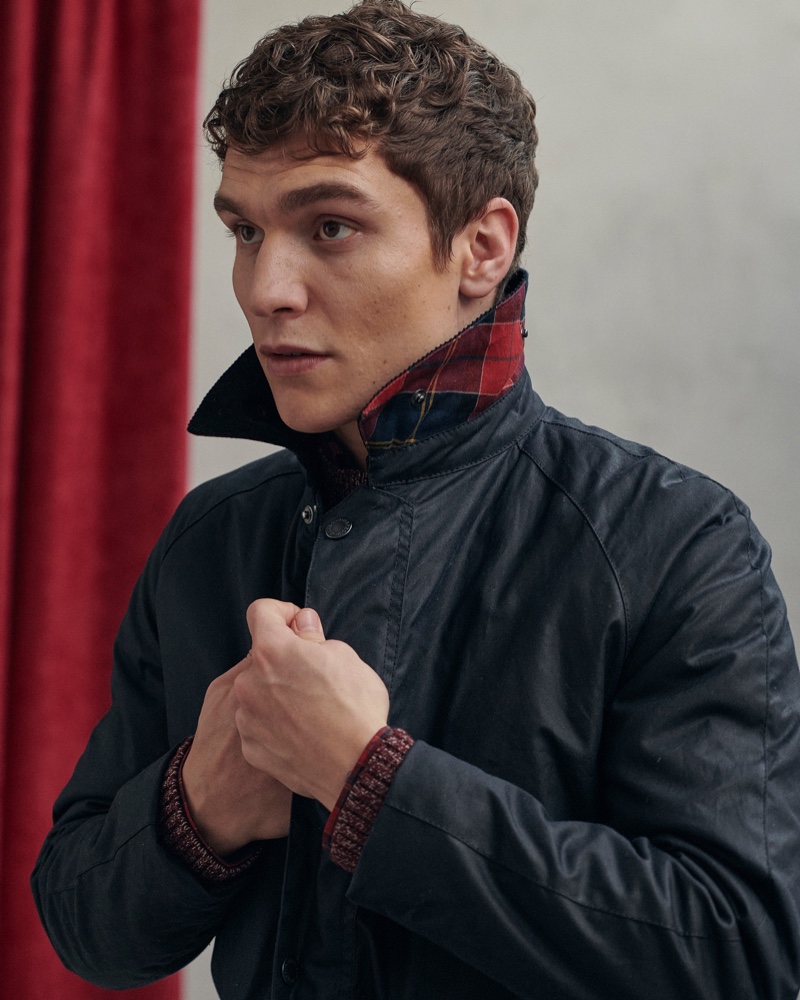 George Admiraal dons a waxed cotton jacket from Barbour's 2021 Tartan collection.