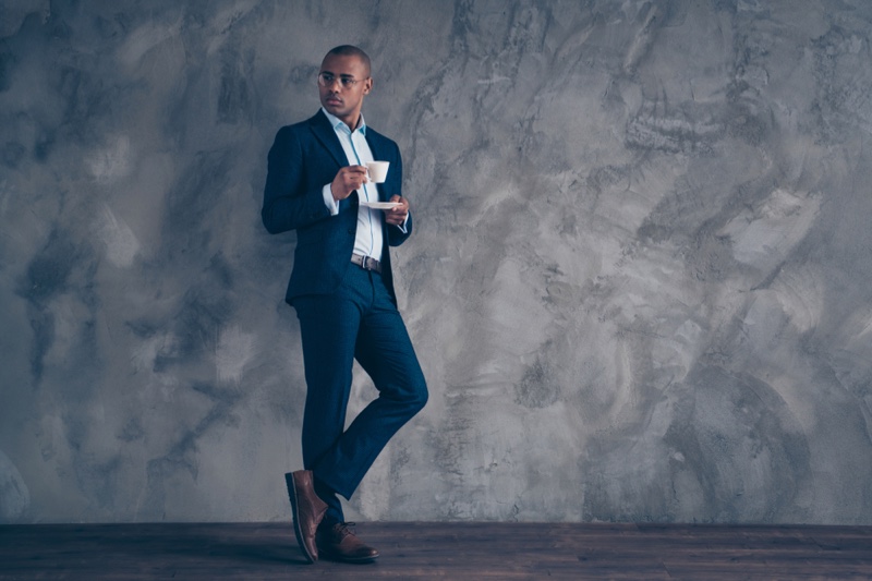 Black Man Suit Holding Coffee Tea Cup