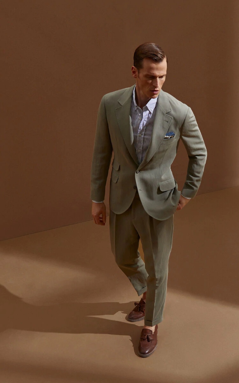 Lars Burmeister dons a linen and cotton satin deconstructed Cavallo suit from Brunello Cucinelli.