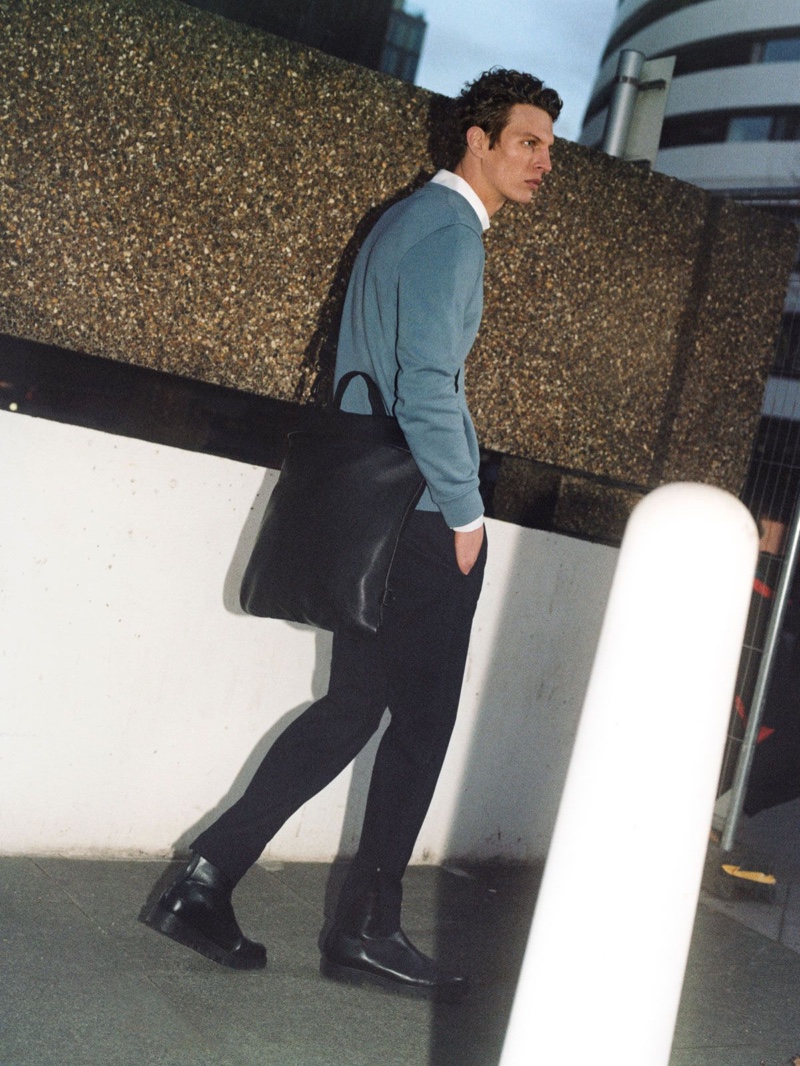 On the move, Tim Schuhmacher models smart pieces from the Core by COS collection.