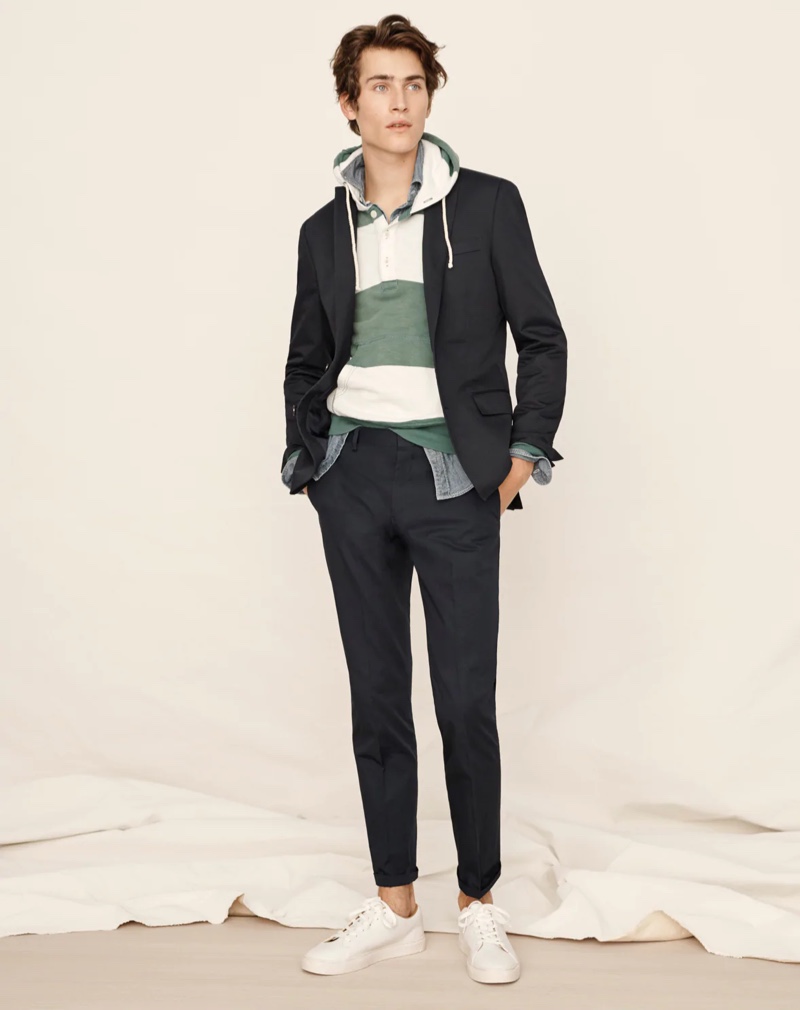 Connecting with J.Crew for spring, Liam Kelly dons an Italian chino Ludlow slim-fit suit jacket and pants. He also wears J.Crew's lightweight sun-faded french terry henley hoodie and slim stretch organic cotton chambray shirt. » Armando, Liam & Mikkel Embrace Sun-kissed Style from J.Crew Connecting with J.Crew for spring, Liam Kelly dons an Italian chino Ludlow slim-fit suit jacket and pants. He also wears J.Crew's lightweight sun-faded french terry henley hoodie and slim stretch organic cotton chambray shirt.