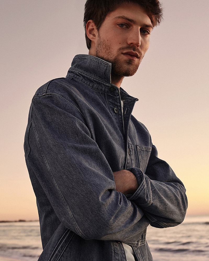 Sporting a jean jacket, Boyd Gates fronts Mango's spring-summer 2021 denim campaign.