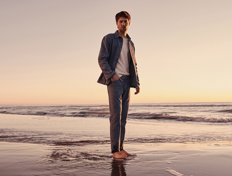 Taking to the Mediterranean, Boyd Gates appears in Mango's spring-summer 2021 denim campaign.