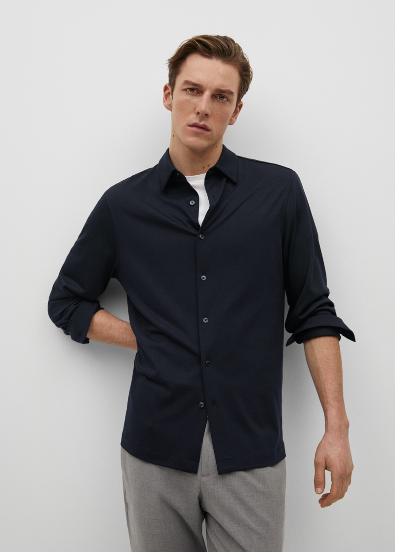 Quentin Demeester sports a slim-fit fluid technical shirt from Mango's performance collection.