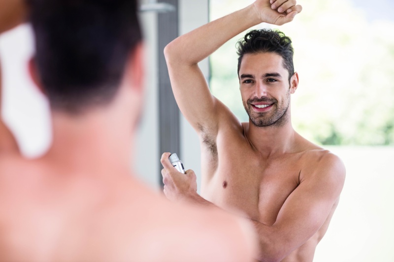 Mirror Man Spraying Deodorant Arm » The Secret To Smelling Great: A Guide For Men Mirror Man Spraying Deodorant Arm