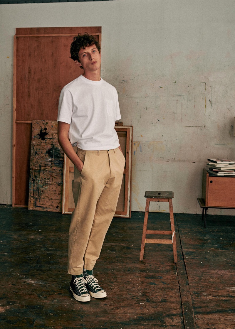 Making a case for smart chinos, Alexis Maçon-Dauxerre wears Octobre Editions.