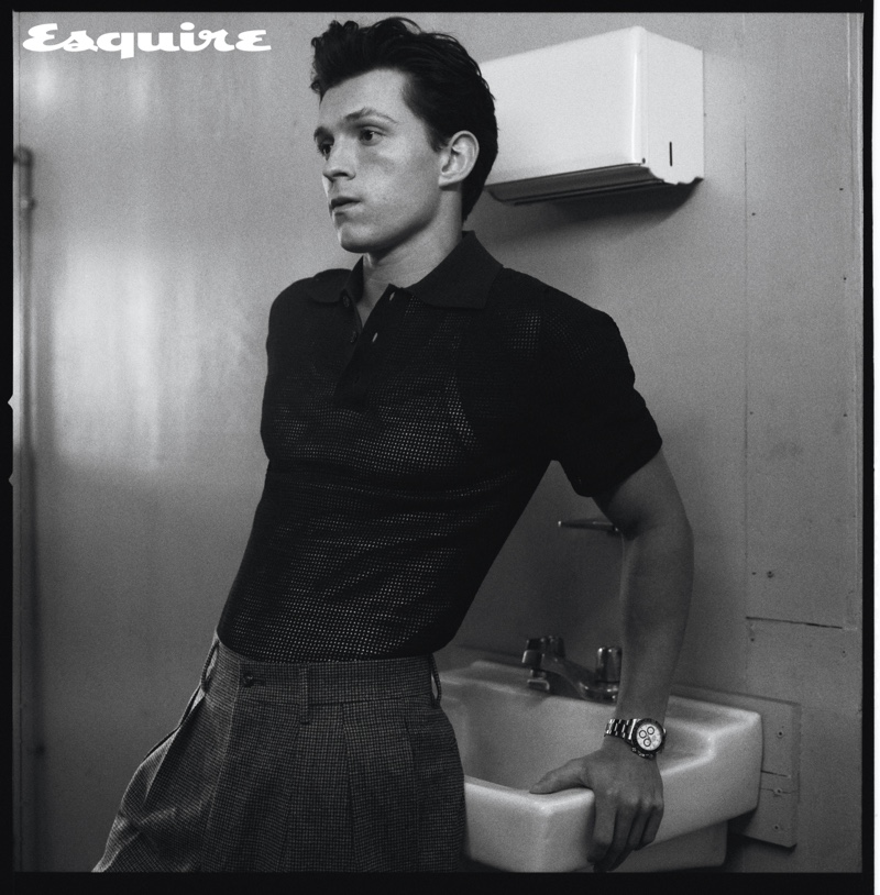 Robbie Fimmano photographs Tom Holland in a Bottega Veneta polo shirt, Dolce & Gabbana tank, and Paul Stuart trousers for Esquire. Holland also dons a Rolex watch. » Tom Holland Covers Esquire, Talks Next Spider-Man & 'Cherry' Robbie Fimmano photographs Tom Holland in a Bottega Veneta polo shirt, Dolce & Gabbana tank, and Paul Stuart trousers for Esquire. Holland also dons a Rolex watch.
