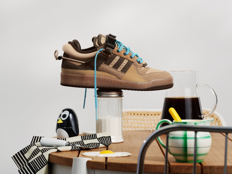 Bad Bunny reinterprets Adidas Originals' iconic Forum Buckle Low sneaker with a coffee-inspired take called "The First Café." 