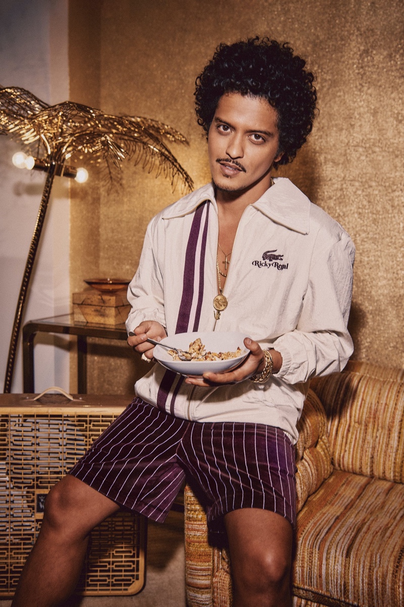 Embracing a retro charm, Bruno Mars stars in the campaign for his Lacoste Ricky Regal collection campaign.