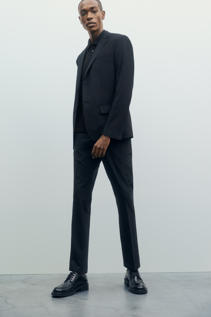 Donning a sleek suit and polo, Sharif Idris showcases must-have pieces from Filippa K's Core collection.