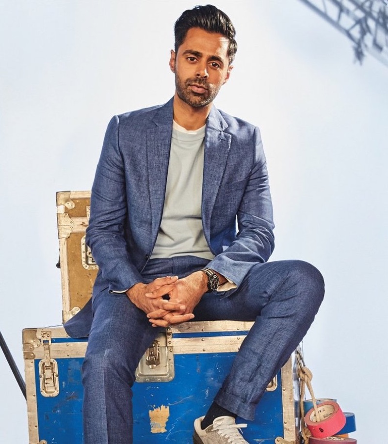 Connecting with Todd Snyder for spring, Hasan Minhaj wears the brand's Italian tropical wool suit and jacket and dress pants with a Todd Snyder + Champion midweight short-sleeve sweatshirt.