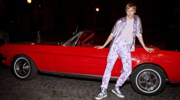 Isabel Marant Cruises Into Spring with Relaxed Style Posing in front of a cherry red convertible, model Kerkko Sariola stars in Isabel Marant's spring-summer 2021 men's campaign.