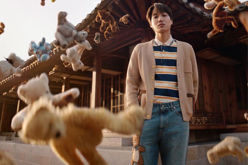 K-pop star Kai rocks teddy bear embroidered jeans from his Gucci capsule collection.