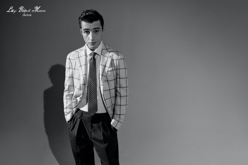 Donning a checked suit jacket and pleated trousers, Adrien Sahores fronts Luigi Bianchi Mantova's spring-summer 2021 campaign. » Adrien Reunites with Luigi Bianchi Mantova for Sartorial Spring Campaign Donning a checked suit jacket and pleated trousers, Adrien Sahores fronts Luigi Bianchi Mantova's spring-summer 2021 campaign.