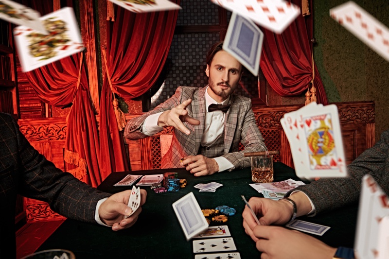 Male Model Gambling Cards Flying Suit