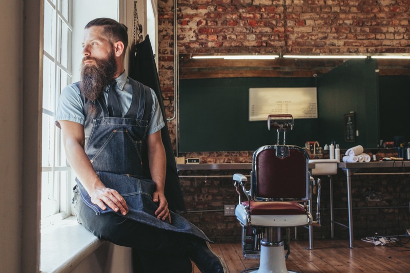 Man Looking Out Window Barber Shop