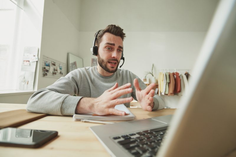 Man Working from Home in Sweatshirt