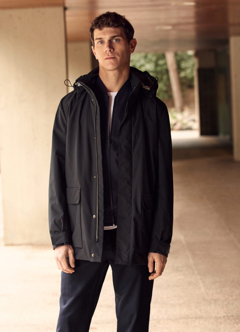 Front and center, Vincent Lacrocq dons a pocket water-repellent trench coat from Mango's High-Performance collection.