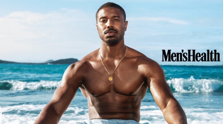 Taking to St. Barts with Men's Health, Michael B. Jordan sports Coach swim shorts with a Movado bracelet.