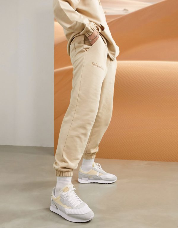 cream colored sweatpants