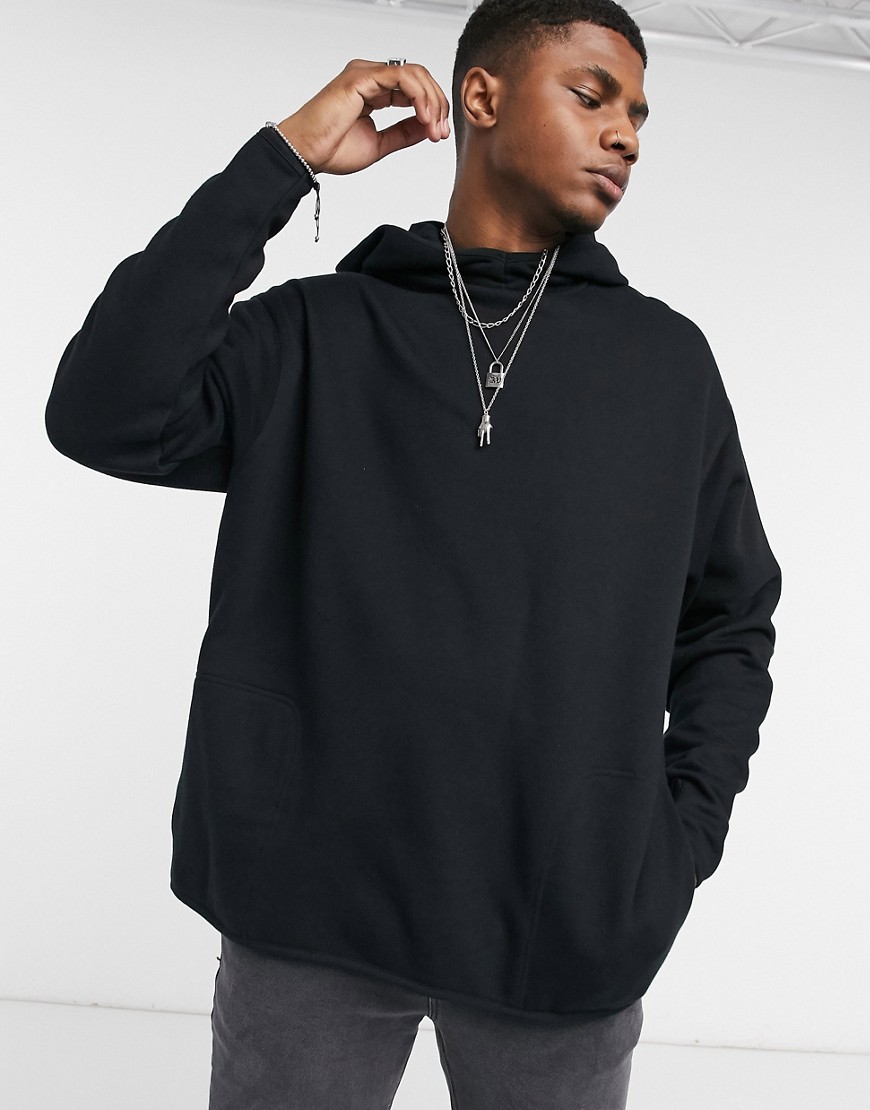 ASOS DESIGN oversized hoodie with square pockets in black | The Fashionisto