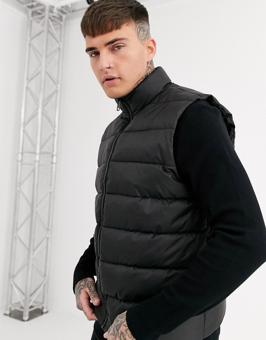 ASOS DESIGN puffer vest in black | The Fashionisto