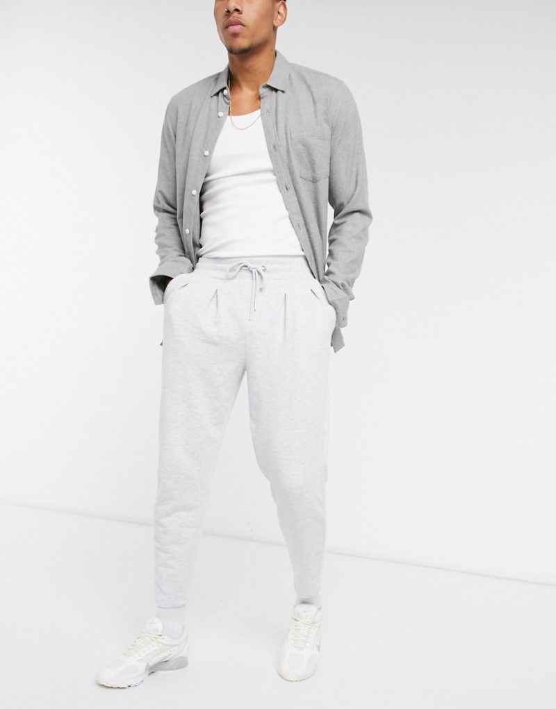 ASOS DESIGN tapered sweatpants with pleats in white marl | The Fashionisto