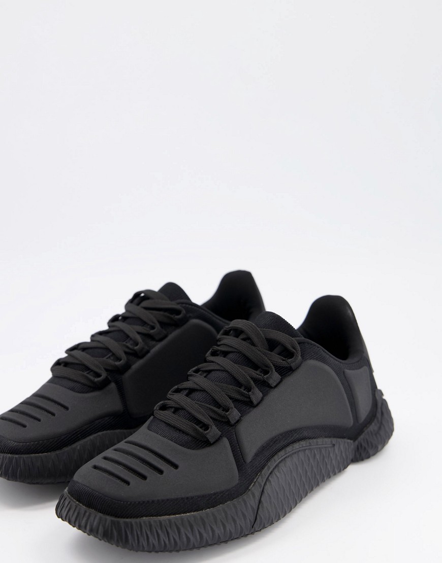 ASOS DESIGN wrap sole sneakers in triple black | The Fashionisto