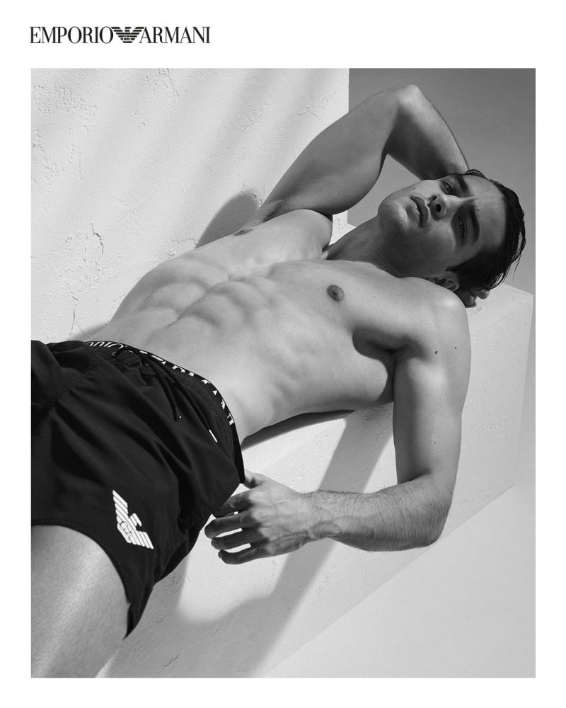 Aleksandar Rusić is a fit vision as he stars in Emporio Armani's summer 2021 swimwear campaign.