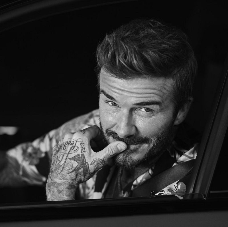 Grinning, David Beckham fronts a new Maserati campaign.