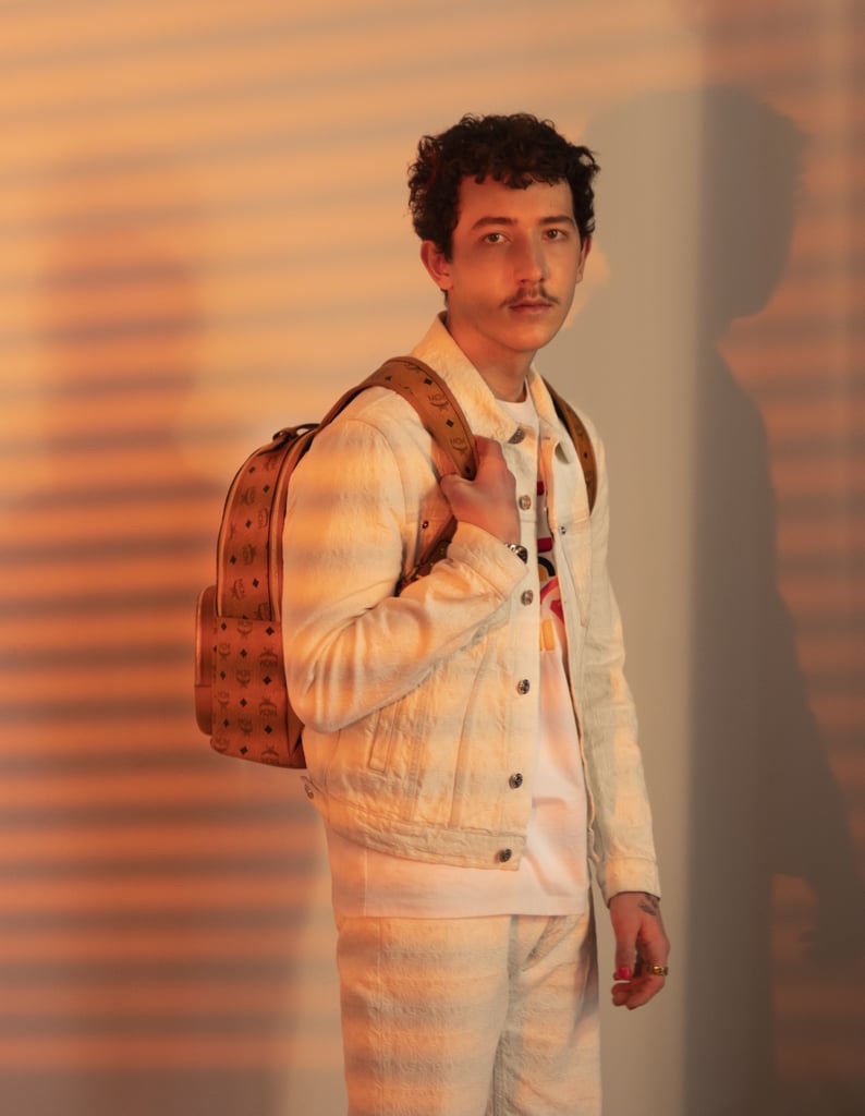 Sporting a leather MCM backpack, Frankie Jonas fronts the brand's spring 2021 campaign.