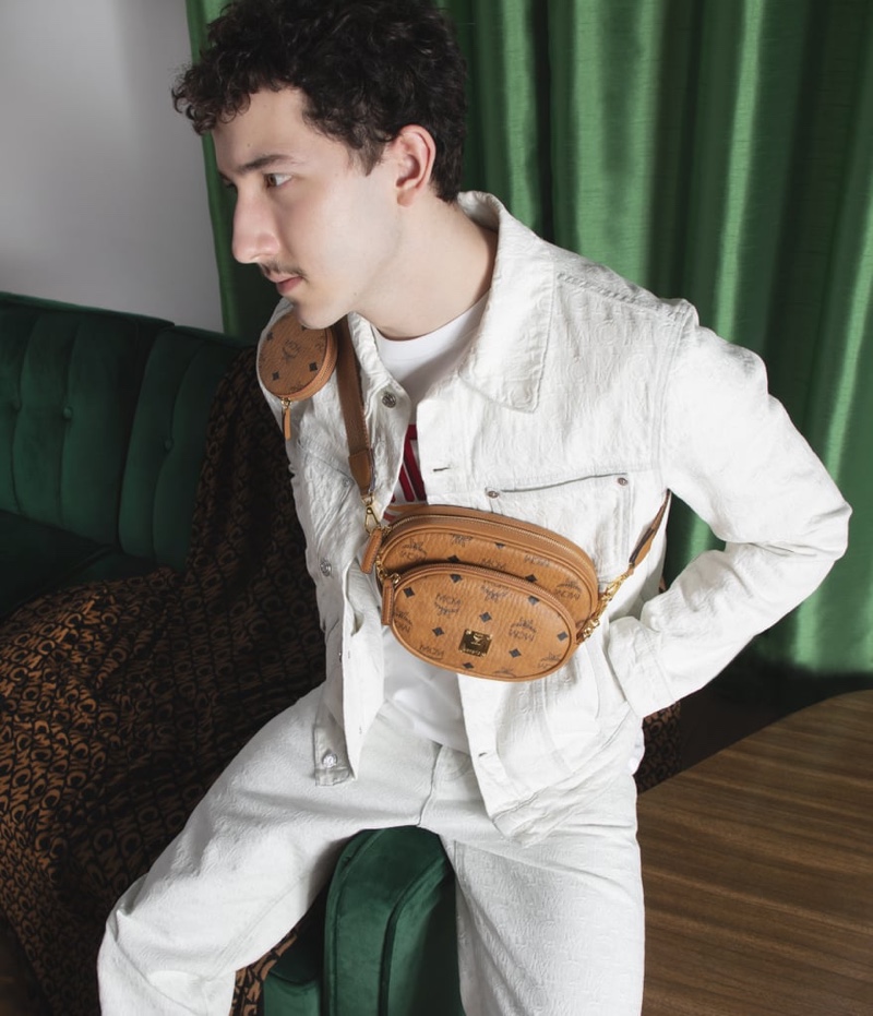 Donning leather accessories from MCM, Frankie Jonas fronts the label's spring 2021 campaign.