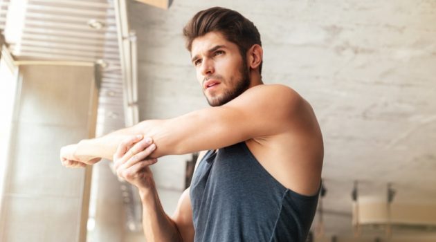 Seven Ways to Avoid Getting Sick All Year Long Healthy Man Warming Up Before Working Out