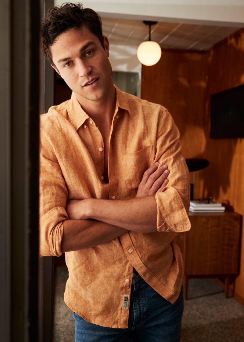 Model Miles McMillan wears a linen shirt with jeans from J.Crew.