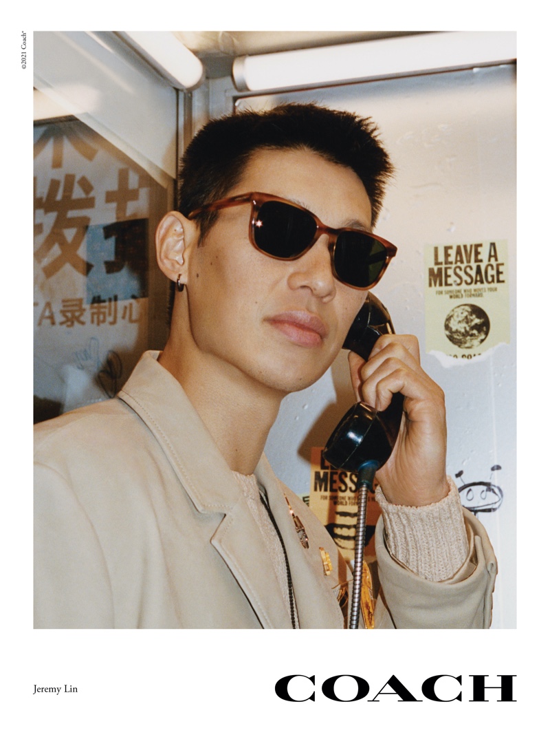 Making a phone call, Jeremy Lin appears in Coach's spring 2021 eyewear campaign.