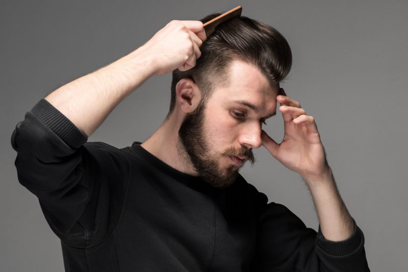 Man Combing Hair