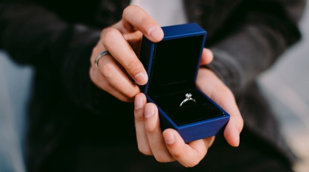 Popular Engagement Ring Box Designs in 2021 Man Holding Blue Engagement Ring Box