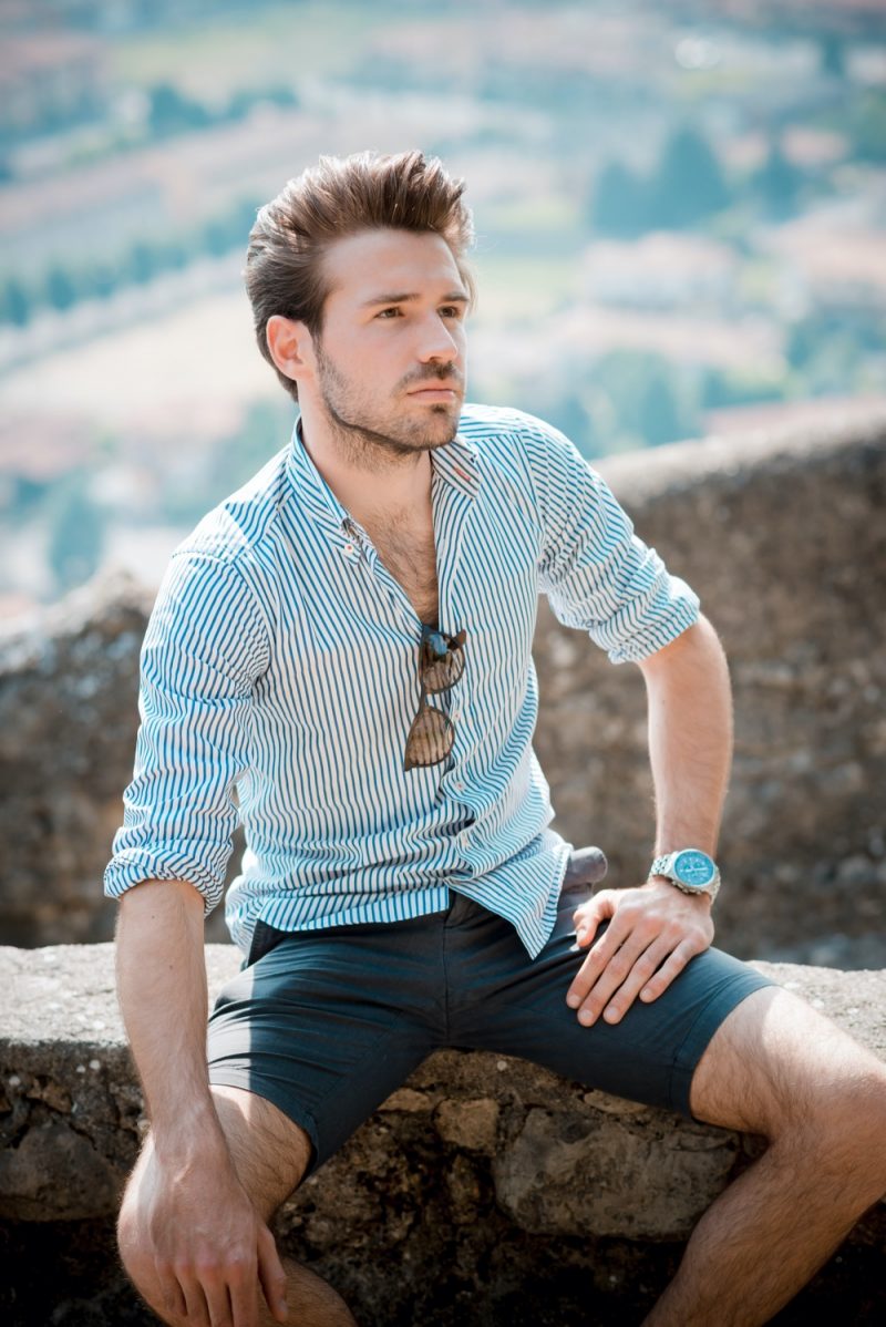 Man Wearing Shirt and Shorts