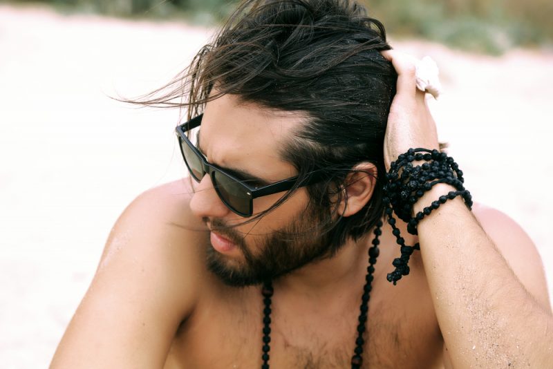 Man at Beach Wearing Sunglasses