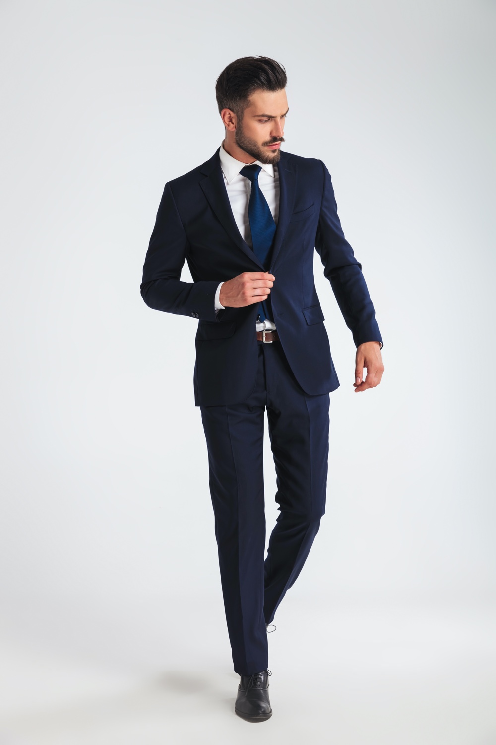 Man in Sharply Tailored Suit